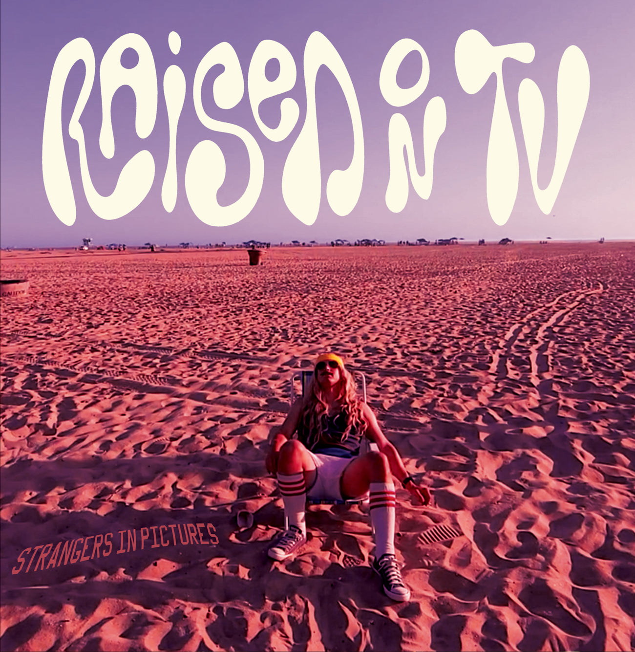 RAISED ON TV • Strangers In Pictures • LP